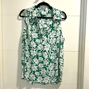 CAbi blue, green and white flowered sleeveless shirt with single button front.☀️